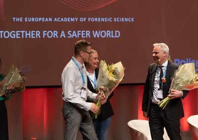 Jonas Malmborg, workshop coordinator, and Ann-Louise Flisbäck, communication officer, receive flowers at the Closing Ceremony. Photo by Marcus Andrae.